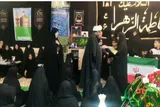 اهدای پرچم جلسات خانگی قرآن به خانواده شهید کیوان پیری