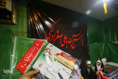 آماده‌سازی لباس همایش جهانی شیرخوارگان حسینی