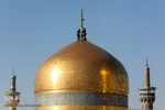 تعویض پرچم گنبد حرم امام رضا(ع)
