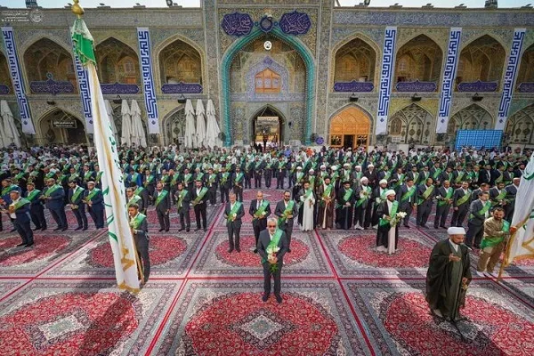 برگزاری مراسم تعویض پرچم حرم امام علی (ع) + عکس