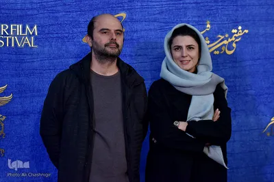 از راست لیلا حاتمی و علی مصفا در فرش قرمز عوامل فیلم «مردی بدون سایه» در ششمین روز سی‌وهفتمین جشنواره فیلم فجر

