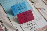 برگه هایی که بجای پول در کمپ های اسرای عراق استفاده میشده.