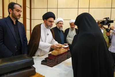 مراسم تجلیل از خانواده‌های شهدای جنگ تحمیلی سوم