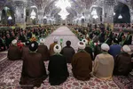 آیین تعویض پرچم گنبد حرم امام رضا(ع)
