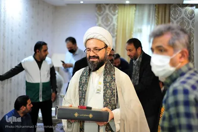 دیدار خدام رضوی با خانواده شهید مدافع حرم حسونی‌زاده