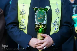 آیین تعویض پرچم سیدالکریم در شب ولادت آن حضرت