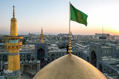 مراسم تعویض پرچم گنبد مطهر حرم امام رضا(علیه‌السلام)