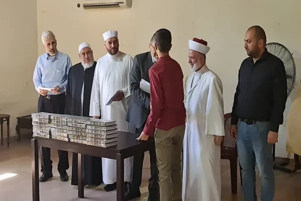 تنظيم مسابقة طلابية لحفظ وتجويدة سورة 