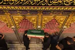 Ташйеи ҷанозаҳои шаҳидон дар канори зариҳи Парчамбардори Карбало + акс
