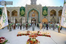 تعویض پرچم حرم حضرت علی(ع)