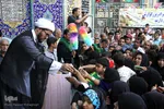 تعويض پرچم گنبد امامزاده علي بن جعفر(ع)