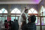 مراسم عقد زوج‌های جوان در آستان علی‌بن مهزیار اهوازی 