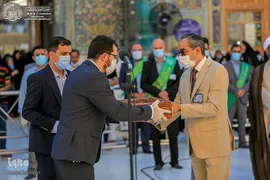 تعویض پرچم حرم حضرت علی(ع)