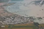 تصاویر هوایی از رودخانه کارون و منطقه سیل‌زده بامدژ