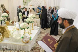 مراسم عقد زوجین جوان در جوار حرم مطهر حضرت شاهچراغ علیه السلام، به‌مناسبت میلاد خجسته مولود کعبه