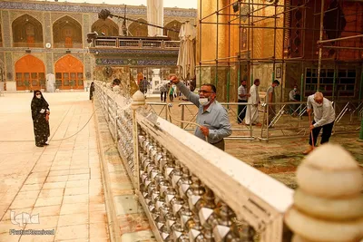 شست و شوی صحن و سرای حرم حضرت علی(ع) از گرد و غبار طوفان شن