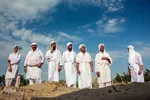 مراسم غسل تعمید منداییان در کنار رودخانه کارون