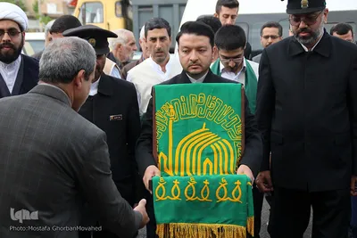حضور خادمین و پرچم حرم مطهر امام رضا(ع) در اهر