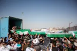مراسم استقبال از پیکرهای 44 شهید تازه تفحص شده دوران دفاع مقدس در مرز بین المللی شلمچه برگزار شد