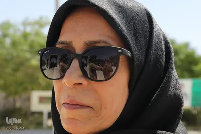 آیین گل مالی لرستانی‌ها مقیم قم در روز عاشورا
