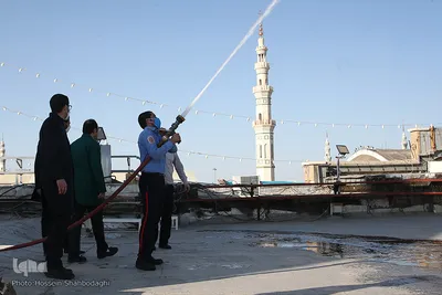 آئین شستشو وتعویض پرچم گنبد مسجد مقدس جمکران