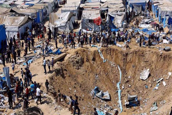 Palestinians inspect a medicine warehouse targeted in an overnight Israeli strike on August 1, 2026.