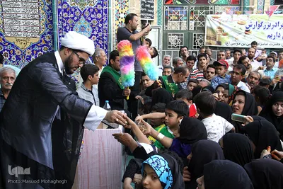 تعويض پرچم گنبد امامزاده علي بن جعفر(ع)