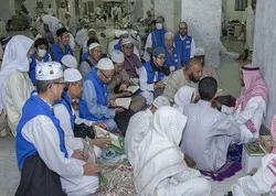 Un groupe de Musulmans japonais au centre des manuscrits coraniques de la Mecque