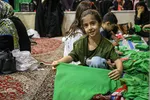 آماده‌سازی لباس همایش جهانی شیرخوارگان حسینی