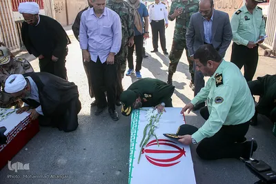 مراسم استقبال از پیکرهای 44 شهید تازه تفحص شده دوران دفاع مقدس در مرز بین المللی شلمچه برگزار شد