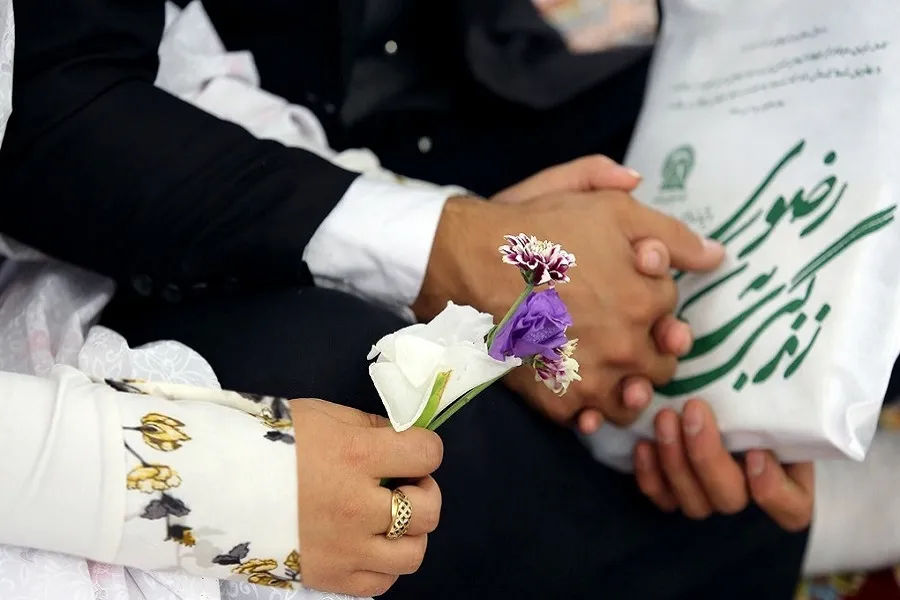 Tens of Migrant Couples Celebrate Marriage in Imam Reza Holy Shrine
