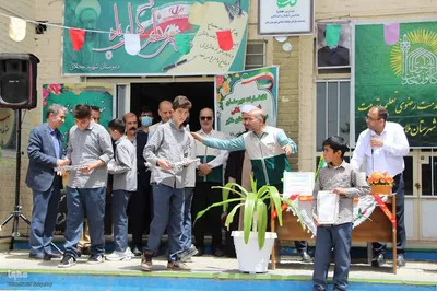 مراسم استقبال از خدام و پرچم رضوی در ملایر