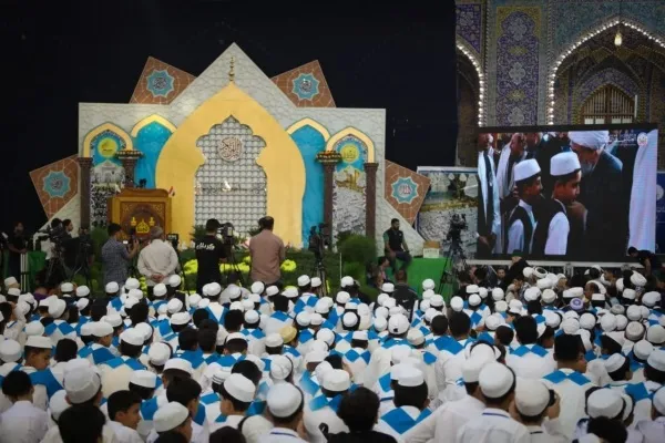 بالصور..حفل تتويج 1252 حافظ وحافظة لكل القرآن في كربلاء