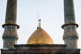 برافراشتن پرچم حرم امام حسین (ع) بر گنبد کربلای ایران