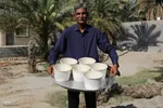 پخت «حلیم در جُم ( خمره) میراثی ۳۰۰ ساله در فین