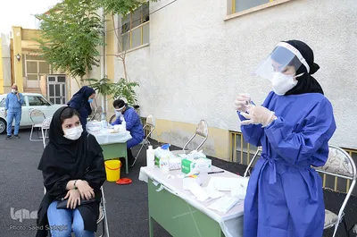 مراسم تحویل صندوق های رای گیری به شعبات اخذ رای و تست کرونا از عوامل برگزاری انتخابات