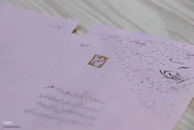 خوشنویسی که هنرش با ذره‌بین دیده می‌شود‎