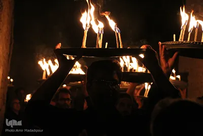 آیین شمع گردانی شب عاشورا در روستای بهدان⁩