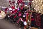 Flowers Showered on Martyred Leader’s Coffin at Karbala Shrine