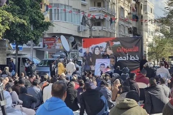 Palestinians Hold Friday Prayers in front of Red Cross Office