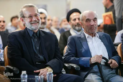 از راست رضا داوری اردکانی، فیلسوف و علی لاریجانی، رییس مجلس شورای اسلامی در مراسم بزرگداشت اولین سالگرد درگذشت حجت‌الاسلام والمسلمین احمد احمدی
