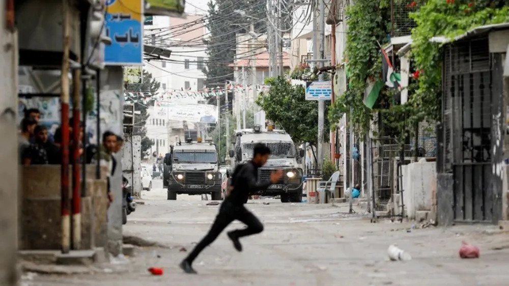 Five Palestinians Injured after Israeli Forces Raid Camp in West Bank