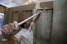 آماده سازی غرفه ایکنا در بیست و سومین نمایشگاه مطبوعات