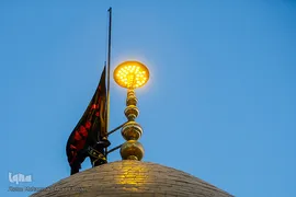 برافراشتن پرچم حرم امام حسین (ع) بر گنبد کربلای ایران