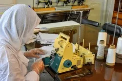 منظمة قرآنية في إیران تطلق معمل إنتاج کمامات لمواجهة كورونا