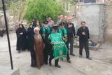تجلیل خادمان حرم حضرت معصومه(س) از خانواده شهدای روستای سرخنکلاته