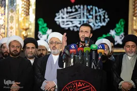 مراسم تعویض پرچم گنبد حرم حضرت اباالفضل العباس(ع) از قرمز به مشکی