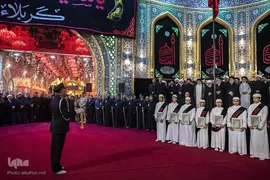 مراسم تعویض پرچم گنبد حرم حضرت اباالفضل العباس(ع) از قرمز به مشکی