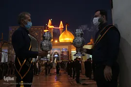 آیین تعویض پرچم و اقامه عزا در حرم حضرت معصومه(س)
