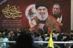 بزرگداشت شهادت سیدحسن نصرالله و عباس نیلفروشان در حرم شاهچراغ